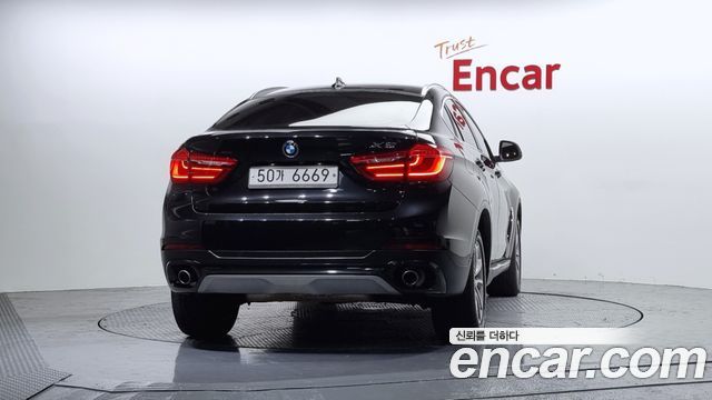 BMW X6 (F16) xDrive 30d 2016 — фото 4