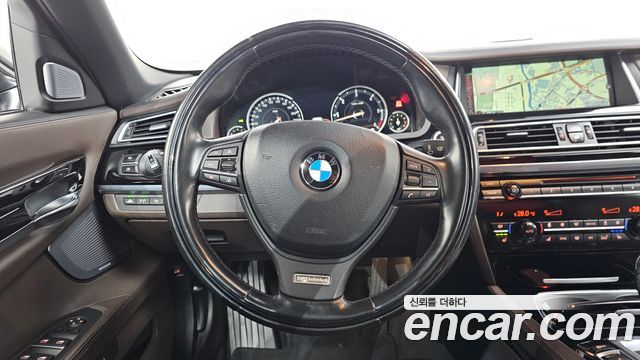 BMW 7 Series (F01) 750Ld xDrive Individual 2015 — фото 13