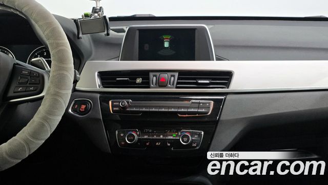 BMW X1 (F48) xDrive 20i Advantage 2020 — фото 14