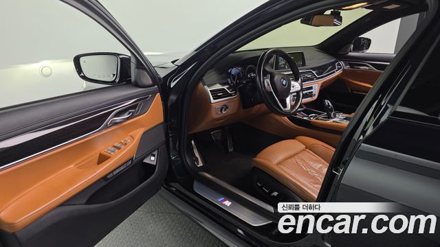 BMW 7 Series (G11) 740d xDrive M Sport 2018 — фото 11