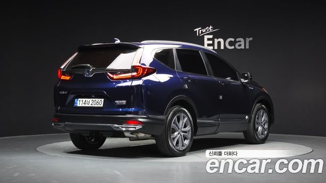 Honda CR-V (V) 2.0 Hybrid Touring 4WD 2022 — фото 2