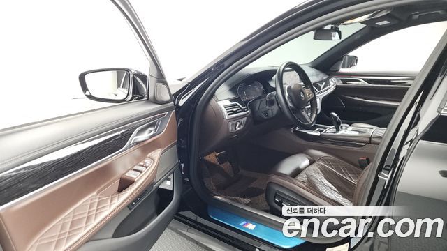 BMW 7 Series (G11) 745e iPerformance M Sport 2020 — фото 10