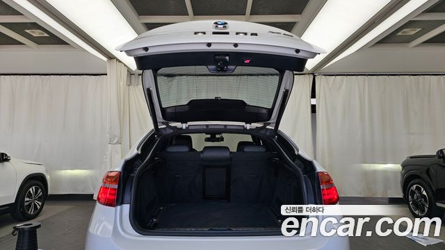 BMW X6 (E71) 40d 2013 — фото 20