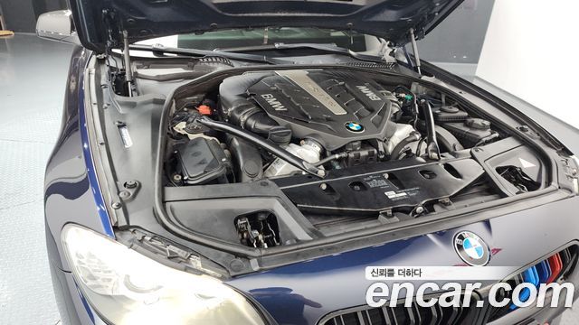 BMW 5 Series (F10) 550i xDrive 2012 — фото 6