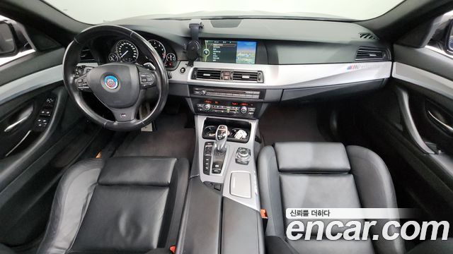 BMW 5 Series (F10) 550i xDrive 2012 — фото 7