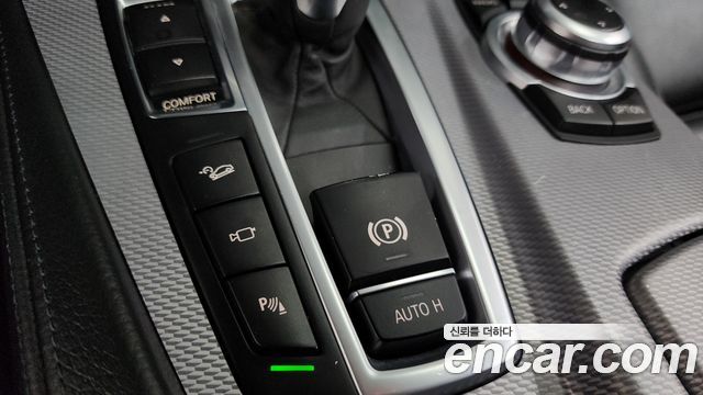 BMW 5 Series (F10) 550i xDrive 2012 — фото 15