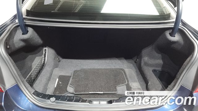 BMW 5 Series (F10) 550i xDrive 2012 — фото 19