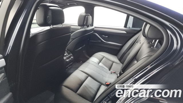 BMW 5 Series (F10) 550i xDrive 2012 — фото 20