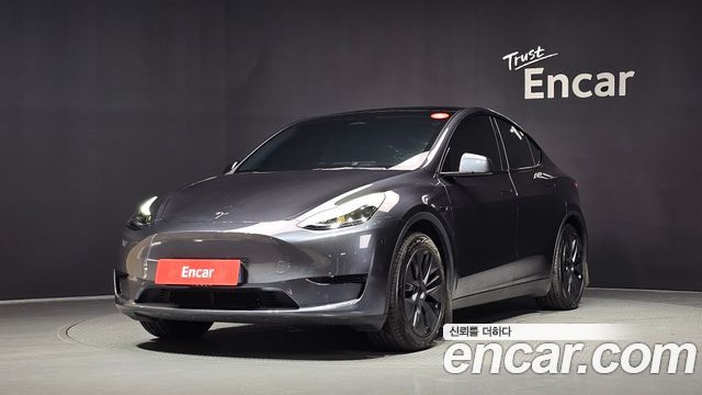 Tesla Model Y RWD 2025 — фото 1