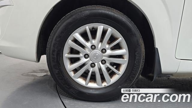 KG Mobility (SsangYong) Korando Turismo 4WD LT 11-seater 2014 — фото 5