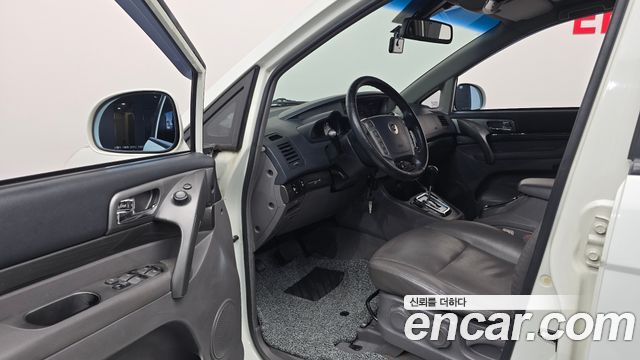 KG Mobility (SsangYong) Korando Turismo 4WD LT 11-seater 2014 — фото 10