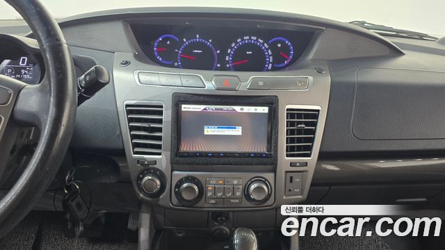 KG Mobility (SsangYong) Korando Turismo 4WD LT 11-seater 2014 — фото 13