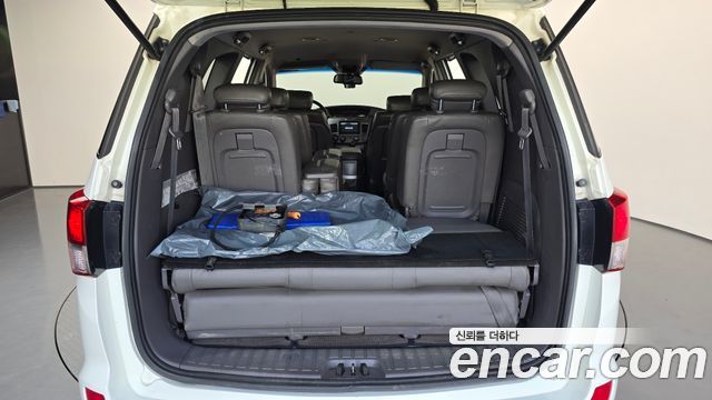 KG Mobility (SsangYong) Korando Turismo 4WD LT 11-seater 2014 — фото 20