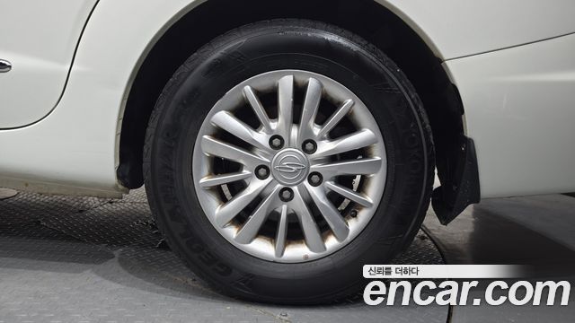 KG Mobility (SsangYong) Korando Turismo 4WD LT 11-seater 2014 — фото 21
