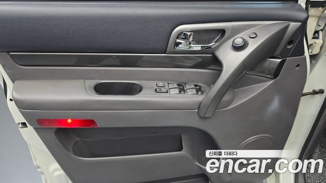 KG Mobility (SsangYong) Korando Turismo 4WD LT 11-seater 2014 — фото 24