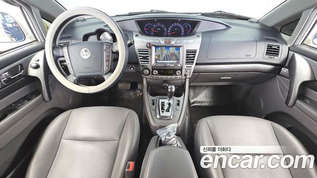 KG Mobility (SsangYong) Korando Turismo 4WD GT 9-seater 2014 — фото 7