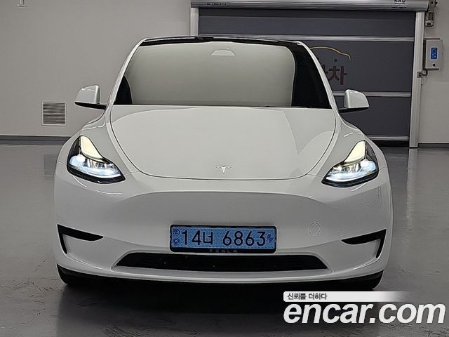 Tesla Model Y RWD 2024 — фото 2