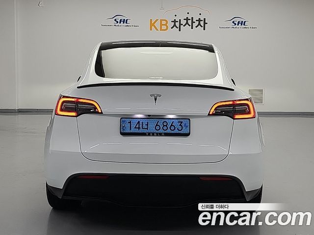 Tesla Model Y RWD 2024 — фото 3