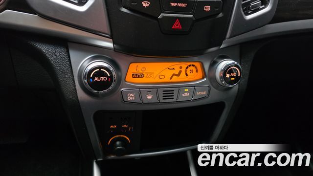 KG Mobility (SsangYong) Korando C 2.0 CVT 4WD Deluxe 2014 — фото 17