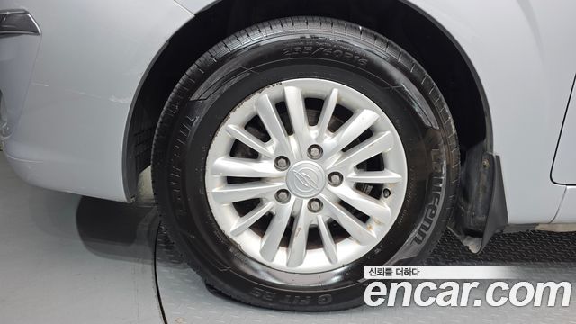 KG Mobility (SsangYong) Korando Turismo 4WD LT 11-seater 2014 — фото 5