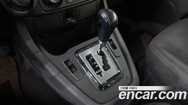 KG Mobility (SsangYong) Korando Turismo 4WD LT 11-seater 2014 — фото 9