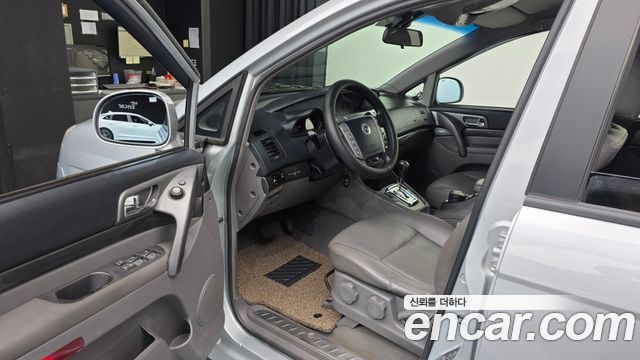 KG Mobility (SsangYong) Korando Turismo 4WD LT 11-seater 2014 — фото 10