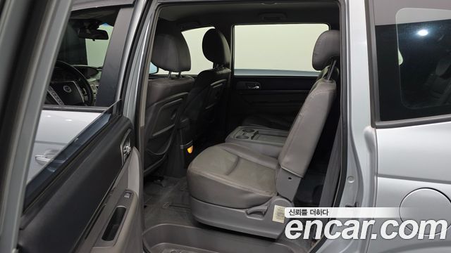 KG Mobility (SsangYong) Korando Turismo 4WD LT 11-seater 2014 — фото 16