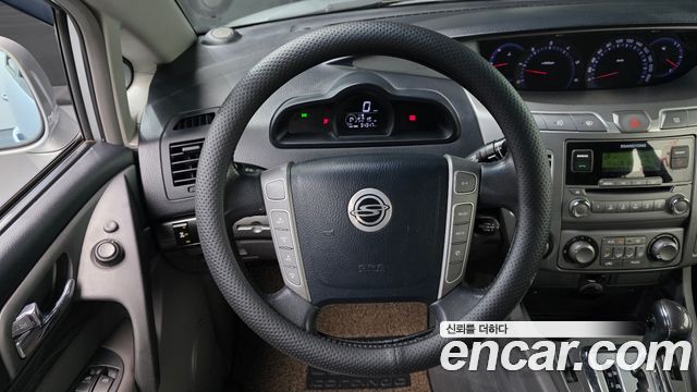 KG Mobility (SsangYong) Korando Turismo 4WD LT 11-seater 2014 — фото 19
