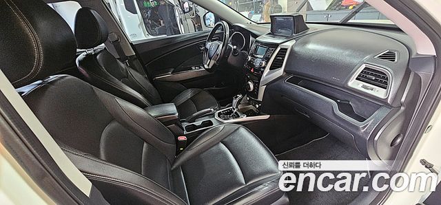 KG Mobility (SsangYong) Tivoli VX 2WD 2015 — фото 17