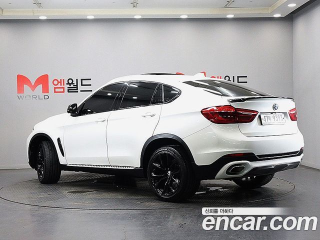 BMW X6 (F16) xDrive 40d 2015 — фото 4