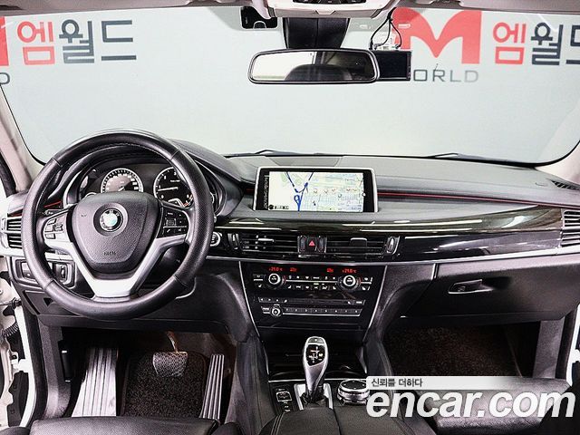BMW X6 (F16) xDrive 40d 2015 — фото 7