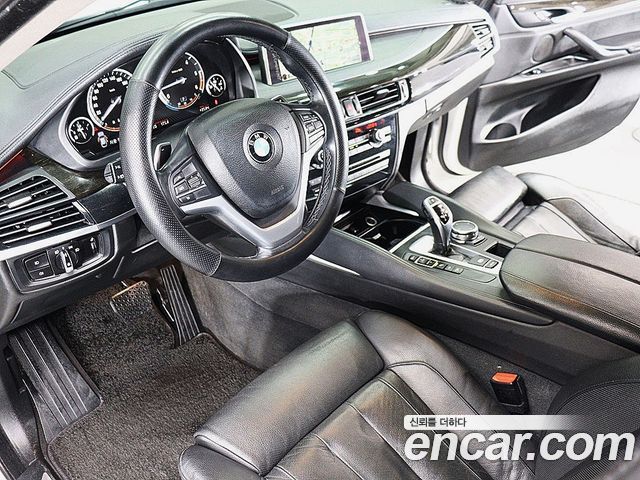 BMW X6 (F16) xDrive 40d 2015 — фото 10