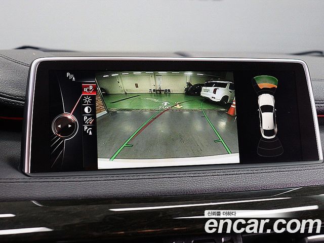 BMW X6 (F16) xDrive 40d 2015 — фото 18