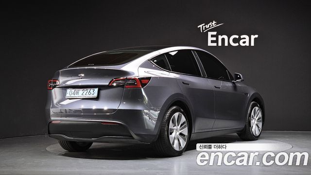 Tesla Model Y RWD 2024 — фото 2