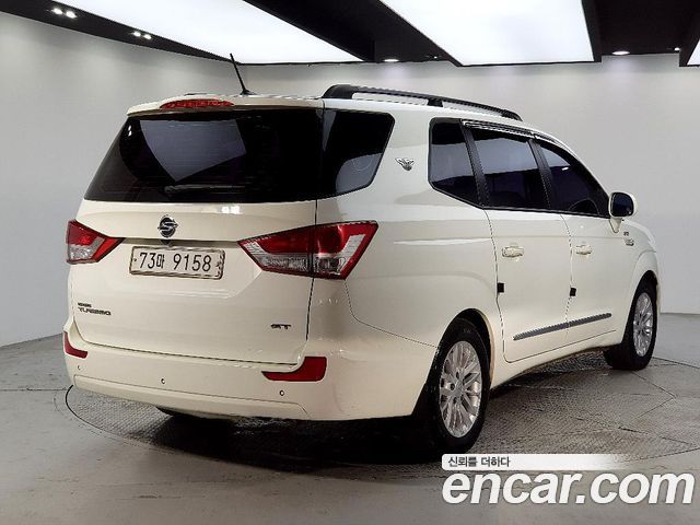 KG Mobility (SsangYong) Korando Turismo 4WD GT 11-seater 2014 — фото 4