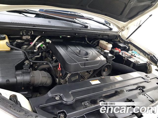 KG Mobility (SsangYong) Korando Turismo 4WD GT 11-seater 2014 — фото 6