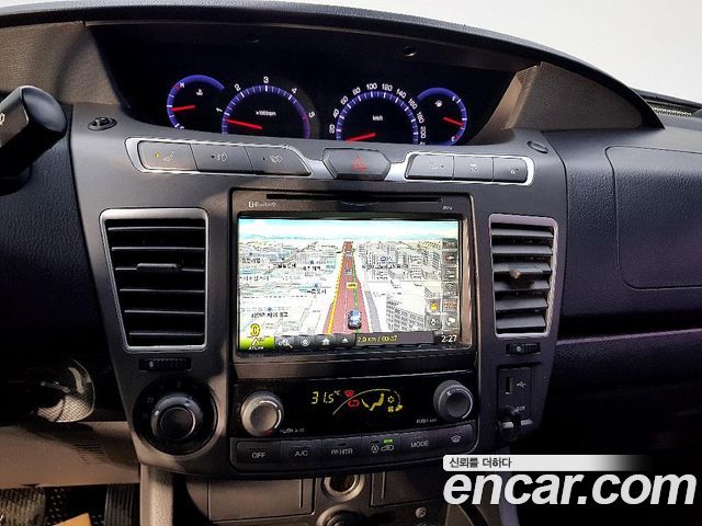 KG Mobility (SsangYong) Korando Turismo 4WD GT 11-seater 2014 — фото 16