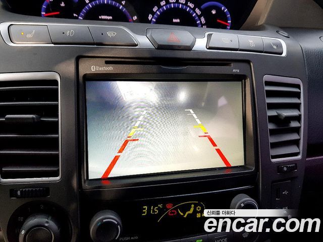 KG Mobility (SsangYong) Korando Turismo 4WD GT 11-seater 2014 — фото 17