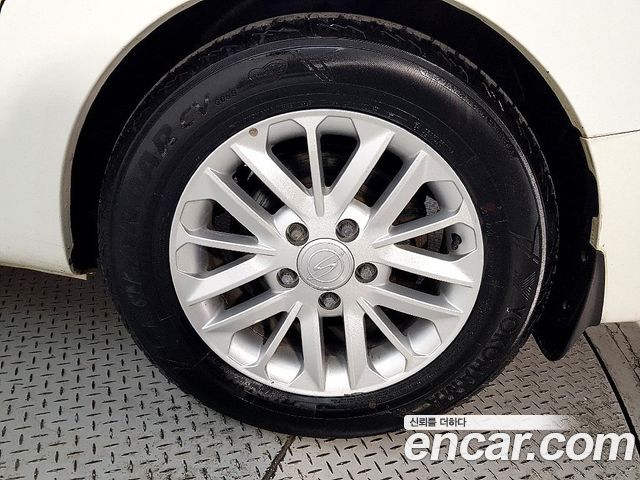 KG Mobility (SsangYong) Korando Turismo 4WD GT 11-seater 2014 — фото 24