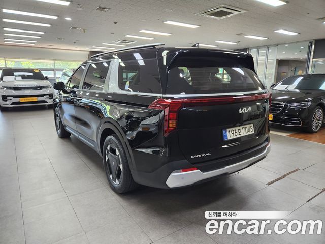 Kia Carnival (IV) HEV 9 seater Prestige 2024 — фото 2
