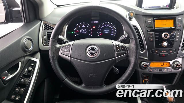 KG Mobility (SsangYong) Korando C 2.0 CVT 4WD Deluxe 2014 — фото 13