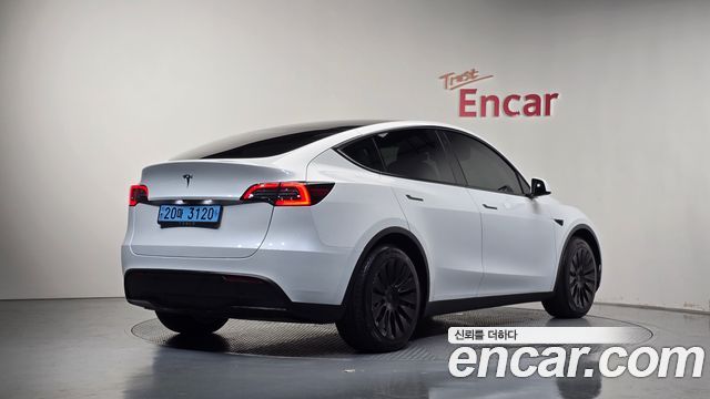 Tesla Model Y RWD 2024 — фото 2