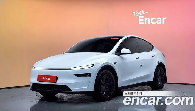 Tesla Model Y RWD 2025 — фото 1