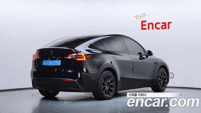 Tesla Model Y RWD 2023 — фото 2
