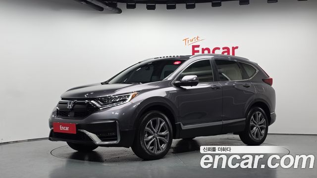 Honda CR-V (V) 2.0 Hybrid Touring 4WD 2021 — фото 1