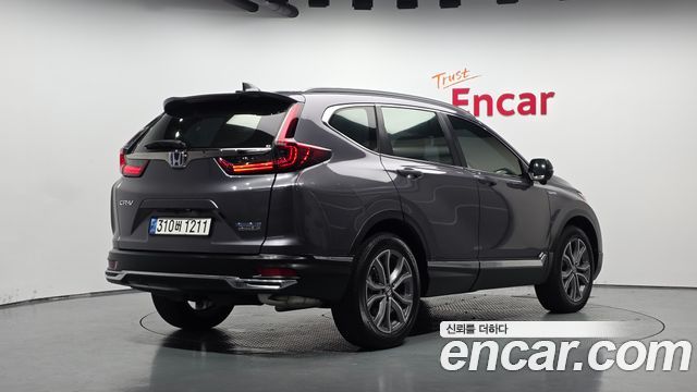 Honda CR-V (V) 2.0 Hybrid Touring 4WD 2021 — фото 2