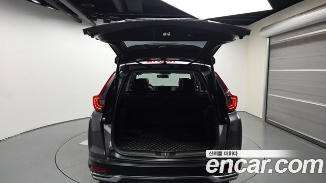 Honda CR-V (V) 2.0 Hybrid Touring 4WD 2021 — фото 20