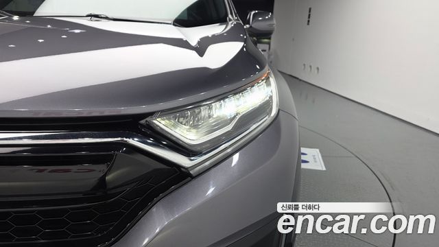 Honda CR-V (V) 2.0 Hybrid Touring 4WD 2021 — фото 22
