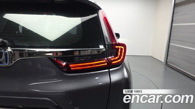 Honda CR-V (V) 2.0 Hybrid Touring 4WD 2021 — фото 23