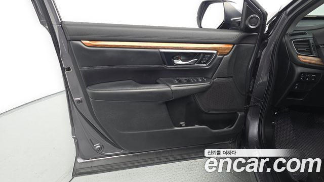 Honda CR-V (V) 2.0 Hybrid Touring 4WD 2021 — фото 24